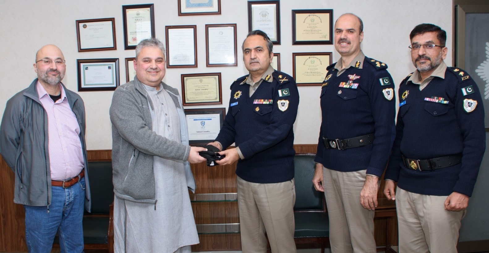 Dr. Sharif Saadullah Khan Presenting Multi-purpose Gloves to IG NHMP, in Recognition the Service of NHMP.