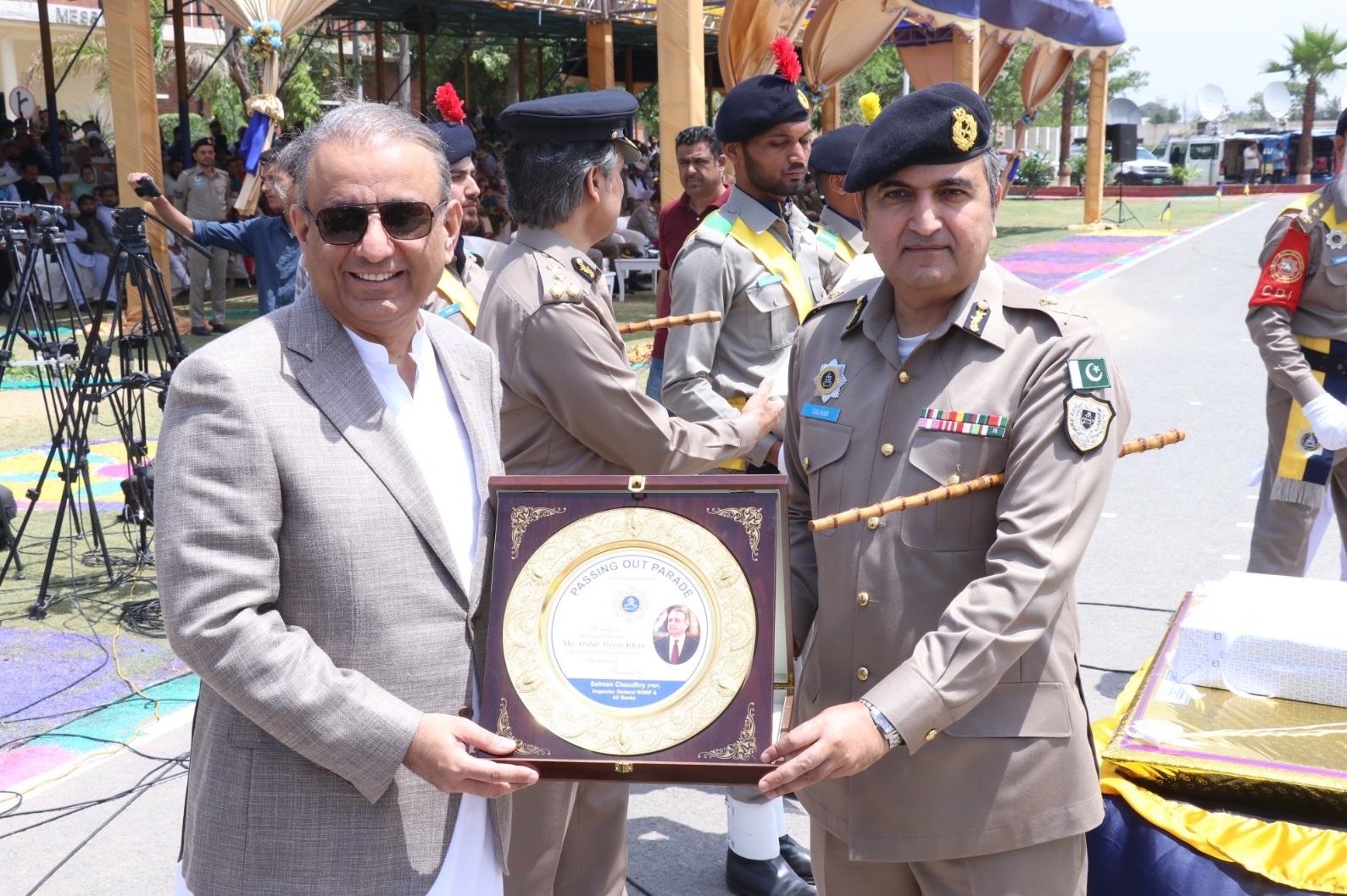 IG NHMP Mr. Salman Chaudhry Presenting the Shield to Minister of Communication Mr. Abdul Aleem Khan